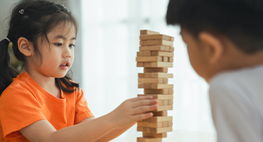 Kids playing Jenga